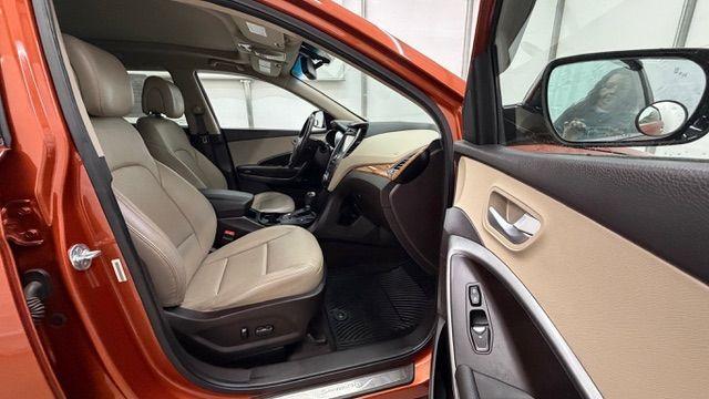 2014 Orange Hyundai Santa Fe Sport 2.4L (5XYZU3LB0EG) with an Theta II 2.4L I-4 gasoline direct injection engine, located at 1806 Veterans Memorial Hwy SW, Austell, GA, 30168, (770) 944-9558, 33.817959, -84.606987 - Photo#18