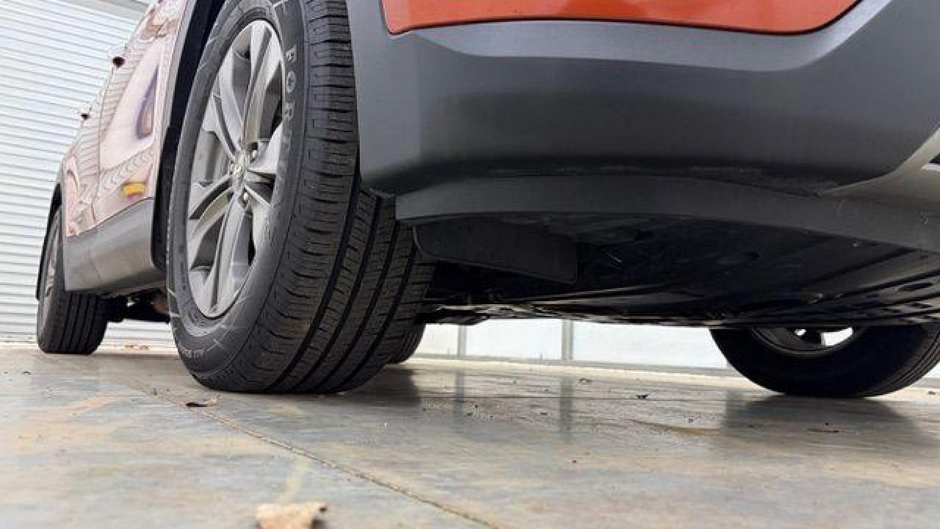 2014 Orange Hyundai Santa Fe Sport 2.4L (5XYZU3LB0EG) with an Theta II 2.4L I-4 gasoline direct injection engine, located at 1806 Veterans Memorial Hwy SW, Austell, GA, 30168, (770) 944-9558, 33.817959, -84.606987 - Photo#19