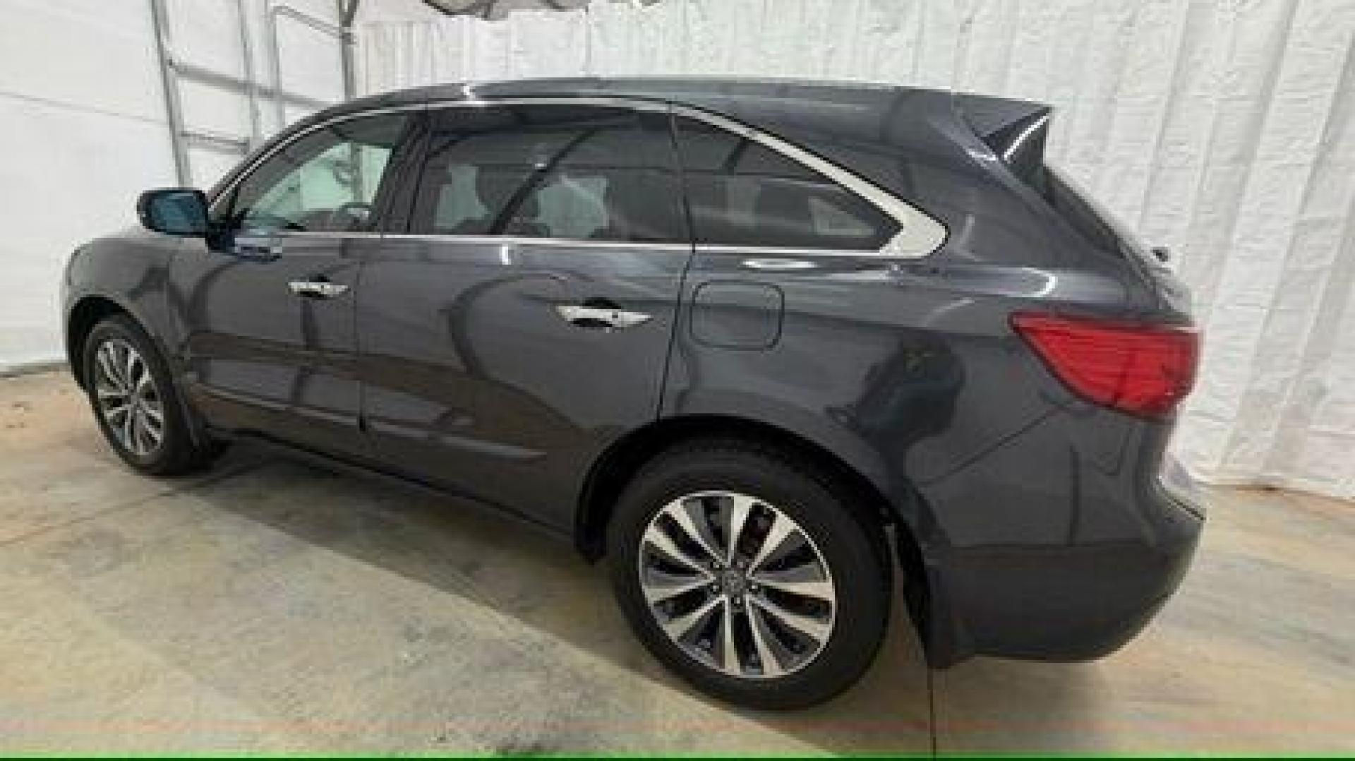 2014 Gray Acura MDX Technology Pkg w/Entertainment Pkg (5FRYD3H67EB) with an 3.5L V-6 gasoline direct injection engine, located at 1806 Veterans Memorial Hwy SW, Austell, GA, 30168, (770) 944-9558, 33.817959, -84.606987 - Photo#2