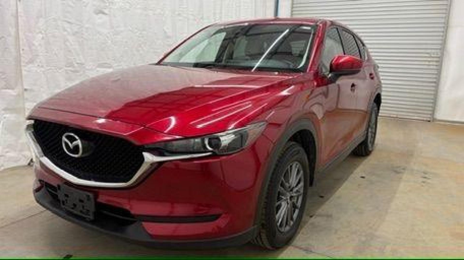 2017 Red Mazda CX-5 Touring (JM3KFBCL5H0) with an SKYACTIV-G 2.5L I-4 gasoline direct injection engine, located at 1806 Veterans Memorial Hwy SW, Austell, GA, 30168, (770) 944-9558, 33.817959, -84.606987 - Photo#0