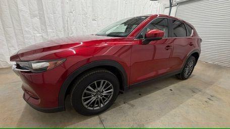 2017 Red Mazda CX-5 Touring (JM3KFBCL5H0) with an SKYACTIV-G 2.5L I-4 gasoline direct injection engine, located at 1806 Veterans Memorial Hwy SW, Austell, GA, 30168, (770) 944-9558, 33.817959, -84.606987 - Photo#1