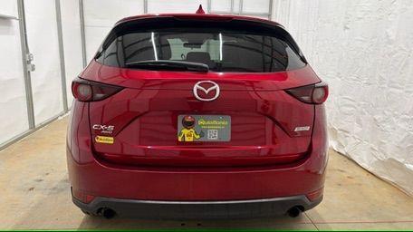 2017 Red Mazda CX-5 Touring (JM3KFBCL5H0) with an SKYACTIV-G 2.5L I-4 gasoline direct injection engine, located at 1806 Veterans Memorial Hwy SW, Austell, GA, 30168, (770) 944-9558, 33.817959, -84.606987 - Photo#4