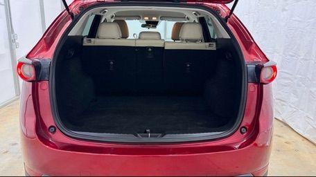 2017 Red Mazda CX-5 Touring (JM3KFBCL5H0) with an SKYACTIV-G 2.5L I-4 gasoline direct injection engine, located at 1806 Veterans Memorial Hwy SW, Austell, GA, 30168, (770) 944-9558, 33.817959, -84.606987 - Photo#5