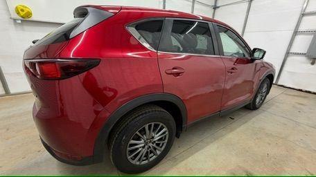 2017 Red Mazda CX-5 Touring (JM3KFBCL5H0) with an SKYACTIV-G 2.5L I-4 gasoline direct injection engine, located at 1806 Veterans Memorial Hwy SW, Austell, GA, 30168, (770) 944-9558, 33.817959, -84.606987 - Photo#7
