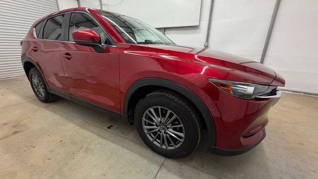 2017 Red Mazda CX-5 Touring (JM3KFBCL5H0) with an SKYACTIV-G 2.5L I-4 gasoline direct injection engine, located at 1806 Veterans Memorial Hwy SW, Austell, GA, 30168, (770) 944-9558, 33.817959, -84.606987 - Photo#8