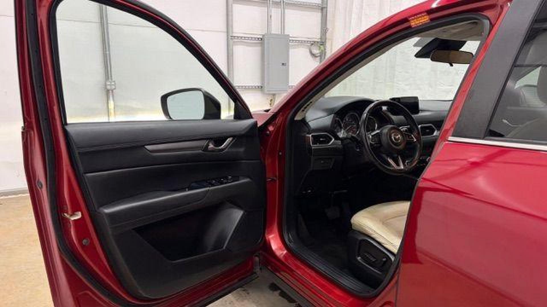 2017 Red Mazda CX-5 Touring (JM3KFBCL5H0) with an SKYACTIV-G 2.5L I-4 gasoline direct injection engine, located at 1806 Veterans Memorial Hwy SW, Austell, GA, 30168, (770) 944-9558, 33.817959, -84.606987 - Photo#11
