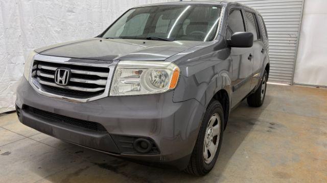 2015 Gray Honda Pilot LX (5FNYF3H28FB) with an 3.5L V-6 i-VTEC VCM variable valve control engine, located at 1806 Veterans Memorial Hwy SW, Austell, GA, 30168, (770) 944-9558, 33.817959, -84.606987 - Photo#0