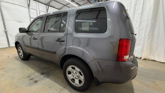 2015 Gray Honda Pilot LX (5FNYF3H28FB) with an 3.5L V-6 i-VTEC VCM variable valve control engine, located at 1806 Veterans Memorial Hwy SW, Austell, GA, 30168, (770) 944-9558, 33.817959, -84.606987 - Photo#2