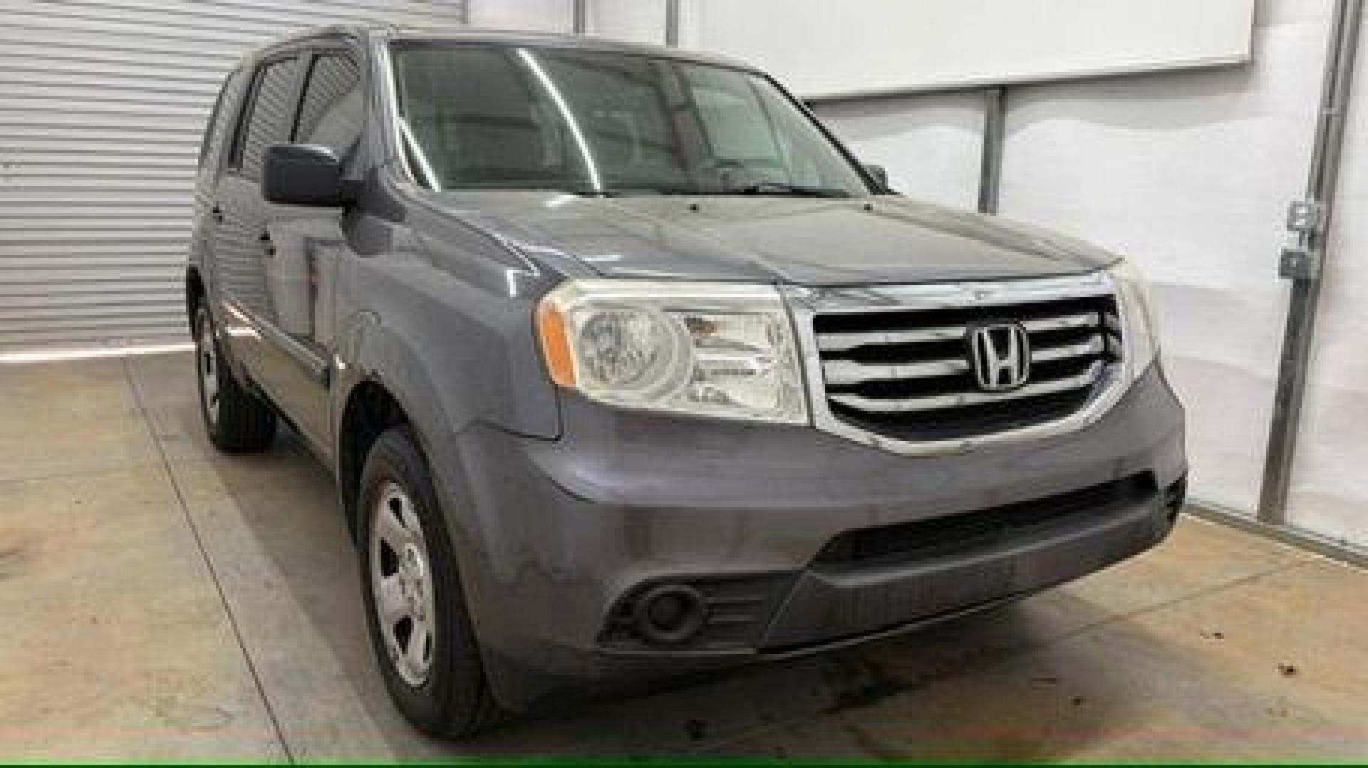 2015 Gray Honda Pilot LX (5FNYF3H28FB) with an 3.5L V-6 i-VTEC VCM variable valve control engine, located at 1806 Veterans Memorial Hwy SW, Austell, GA, 30168, (770) 944-9558, 33.817959, -84.606987- Photo#8
