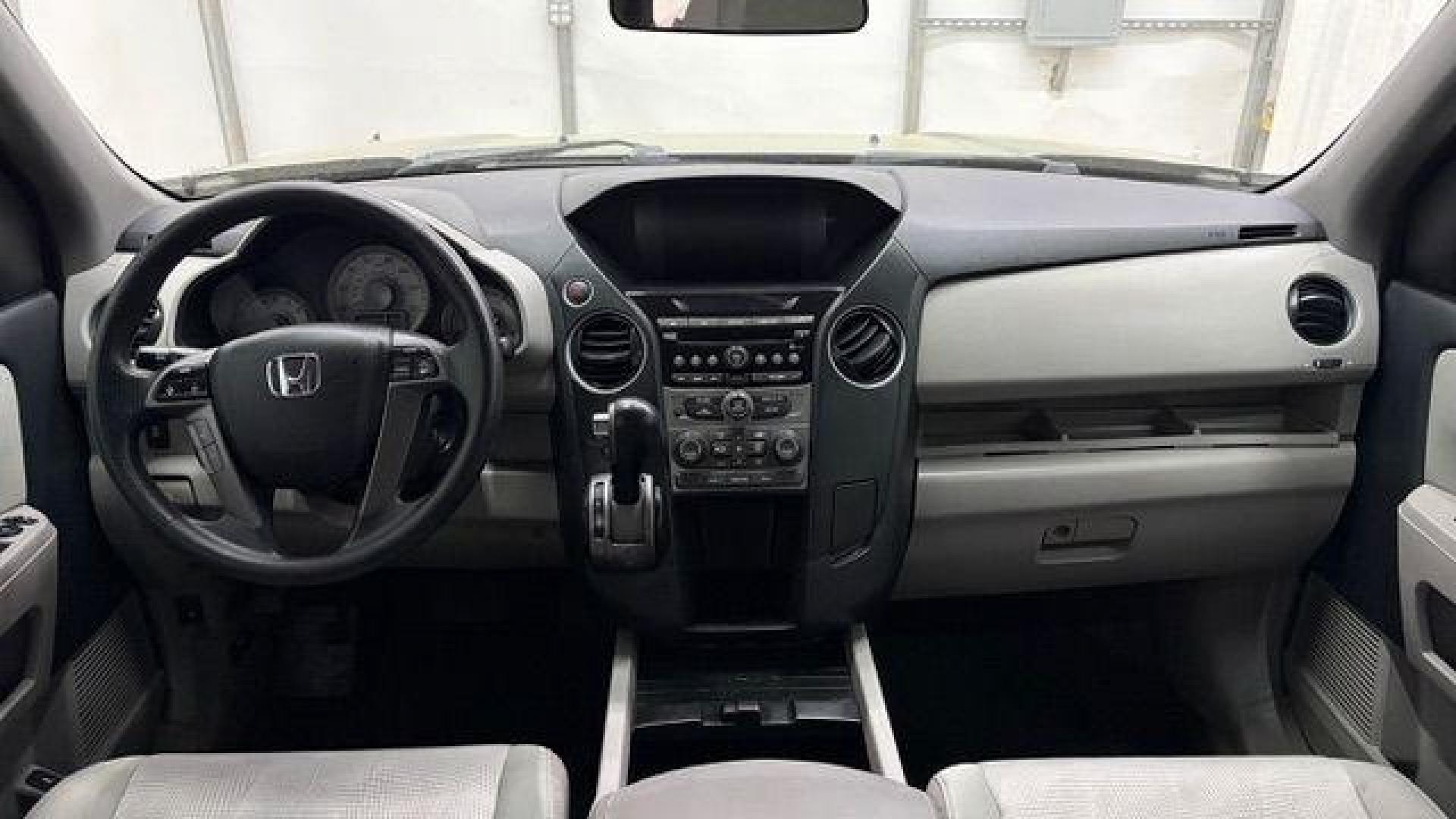 2015 Gray Honda Pilot LX (5FNYF3H28FB) with an 3.5L V-6 i-VTEC VCM variable valve control engine, located at 1806 Veterans Memorial Hwy SW, Austell, GA, 30168, (770) 944-9558, 33.817959, -84.606987- Photo#16