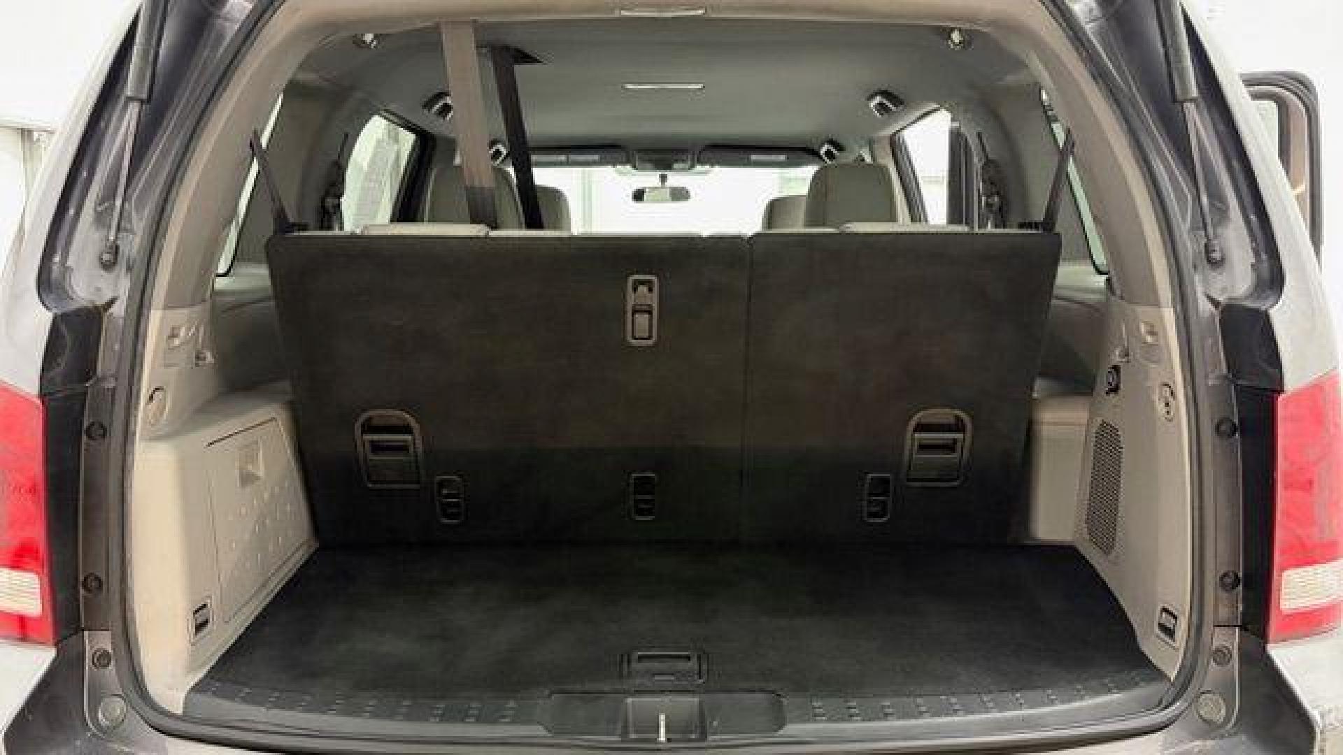 2015 Gray Honda Pilot LX (5FNYF3H28FB) with an 3.5L V-6 i-VTEC VCM variable valve control engine, located at 1806 Veterans Memorial Hwy SW, Austell, GA, 30168, (770) 944-9558, 33.817959, -84.606987- Photo#17