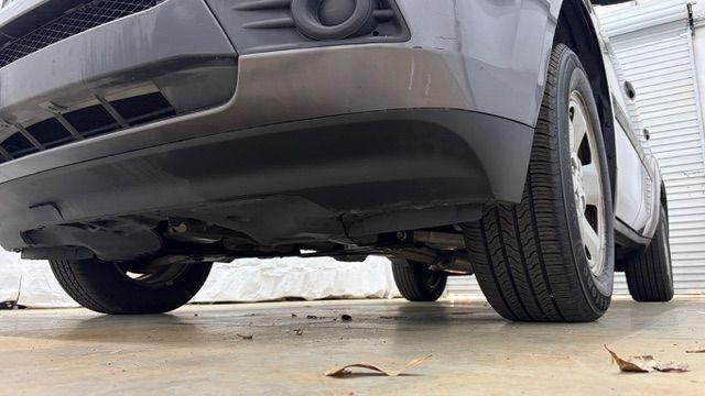 2015 Gray Honda Pilot LX (5FNYF3H28FB) with an 3.5L V-6 i-VTEC VCM variable valve control engine, located at 1806 Veterans Memorial Hwy SW, Austell, GA, 30168, (770) 944-9558, 33.817959, -84.606987 - Photo#21