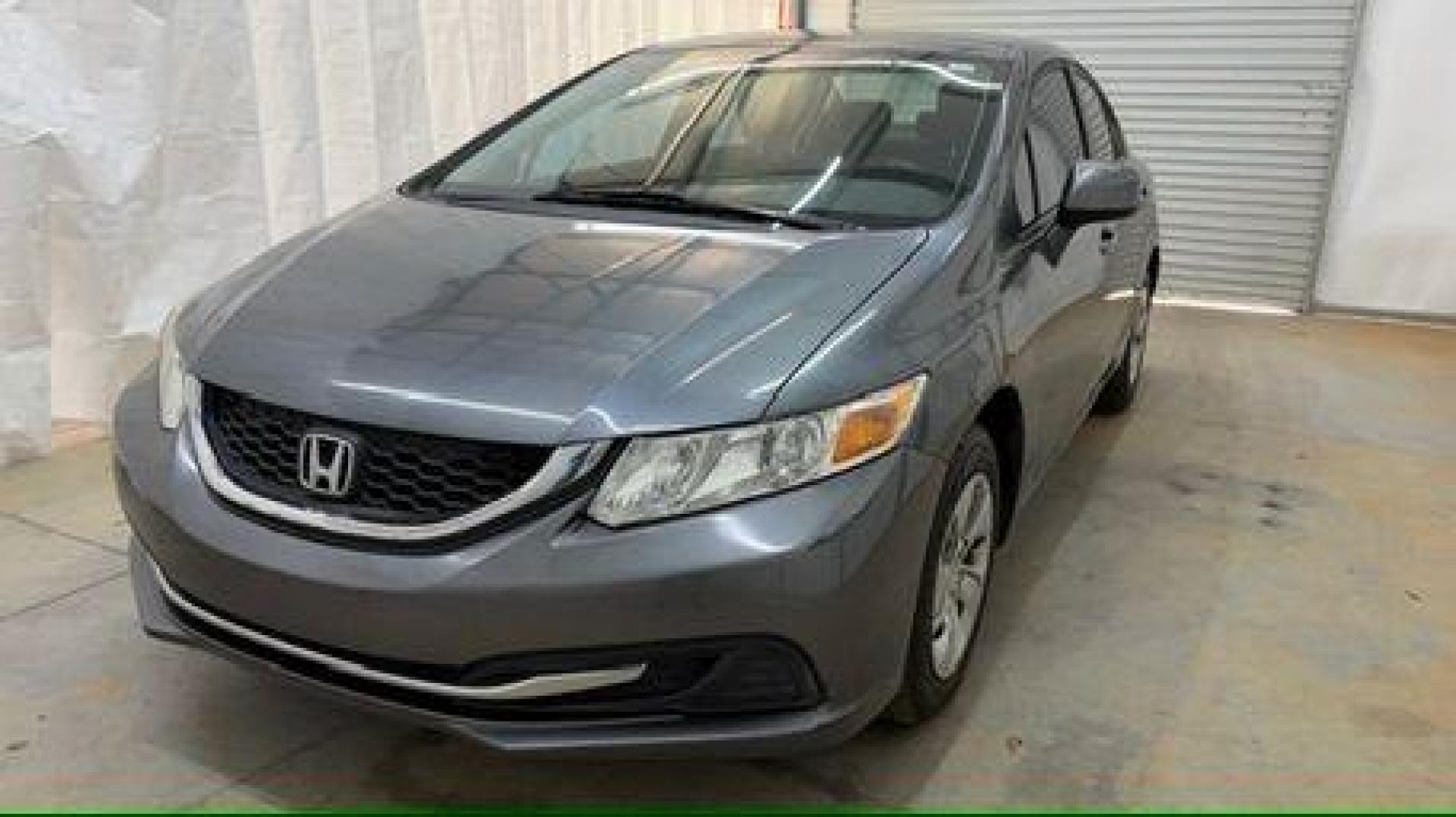 2013 Gray Honda Civic LX (19XFB2F52DE) with an 1.8L I-4 i-VTEC variable valve control engine, located at 1806 Veterans Memorial Hwy SW, Austell, GA, 30168, (770) 944-9558, 33.817959, -84.606987 - Photo#0