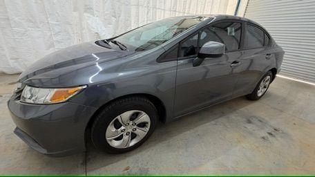2013 Gray Honda Civic LX (19XFB2F52DE) with an 1.8L I-4 i-VTEC variable valve control engine, located at 1806 Veterans Memorial Hwy SW, Austell, GA, 30168, (770) 944-9558, 33.817959, -84.606987 - Photo#1