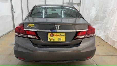 2013 Gray Honda Civic LX (19XFB2F52DE) with an 1.8L I-4 i-VTEC variable valve control engine, located at 1806 Veterans Memorial Hwy SW, Austell, GA, 30168, (770) 944-9558, 33.817959, -84.606987 - Photo#4