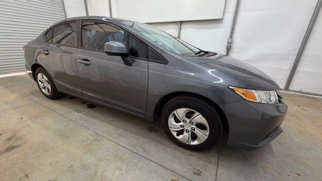2013 Gray Honda Civic LX (19XFB2F52DE) with an 1.8L I-4 i-VTEC variable valve control engine, located at 1806 Veterans Memorial Hwy SW, Austell, GA, 30168, (770) 944-9558, 33.817959, -84.606987 - Photo#7