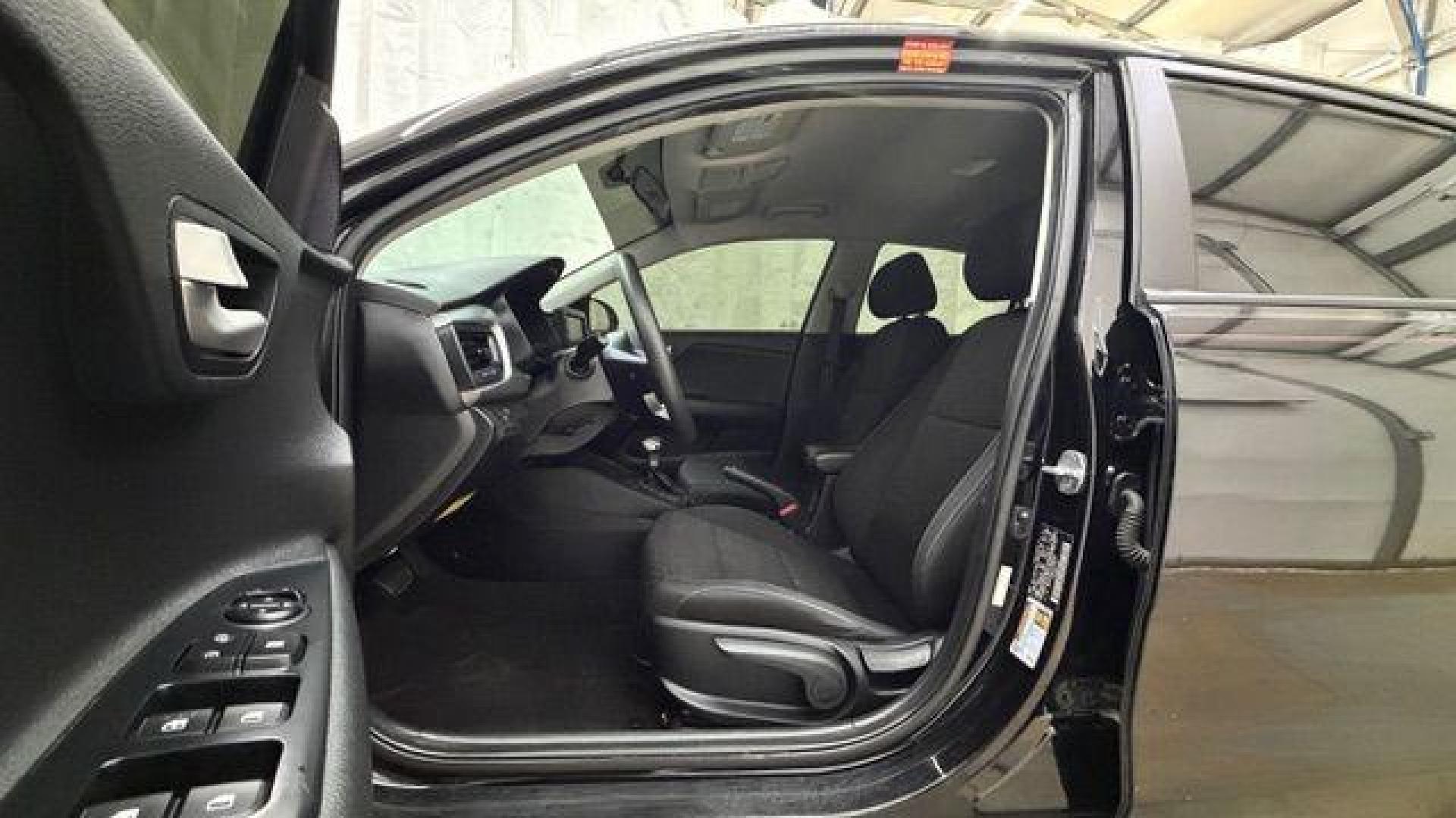 2020 Black Kia Rio S (3KPA24AD2LE) with an Gamma II 1.6L I-4 DOHC engine, located at 1806 Veterans Memorial Hwy SW, Austell, GA, 30168, (770) 944-9558, 33.817959, -84.606987 - Photo#12