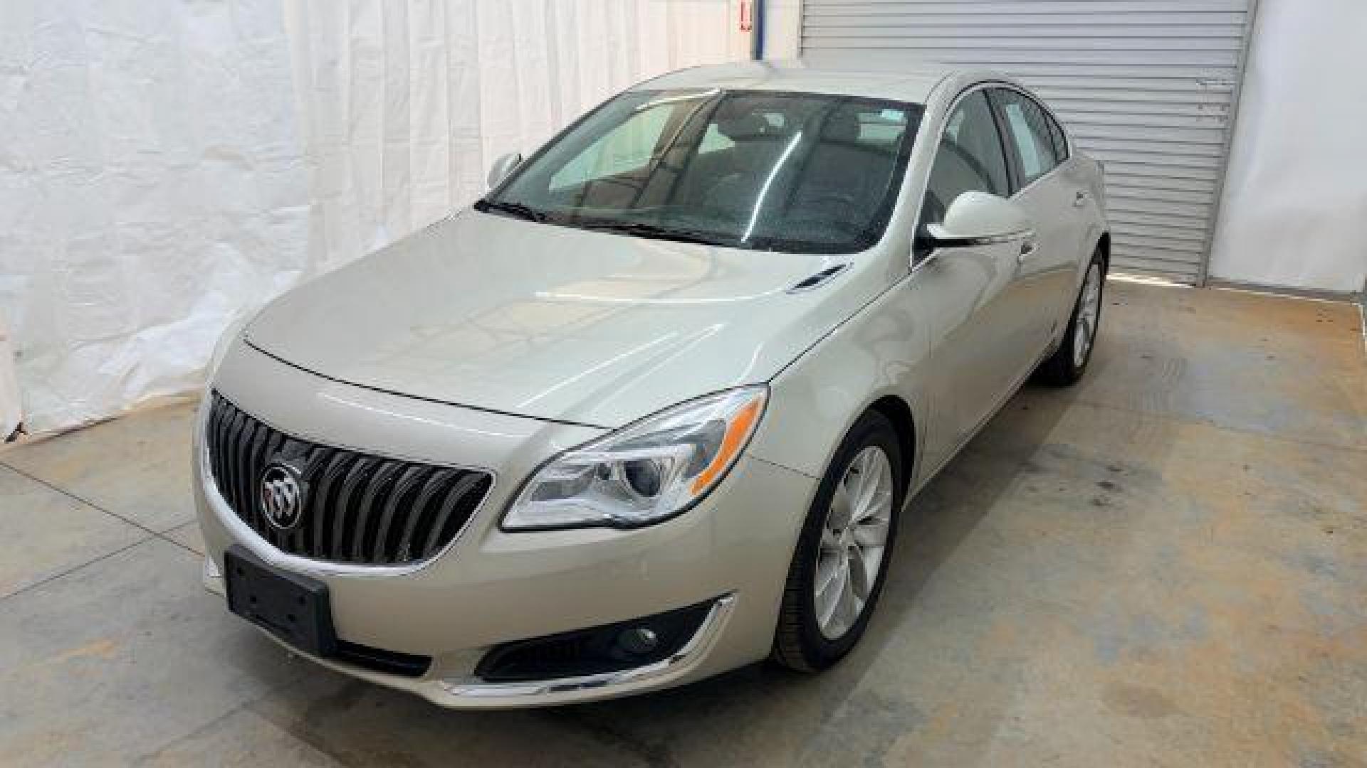 2016 White Buick Regal Turbo (2G4GK5EX3G9) with an 2L I-4 gasoline direct injection engine, located at 1806 Veterans Memorial Hwy SW, Austell, GA, 30168, (770) 944-9558, 33.817959, -84.606987 - Photo#0