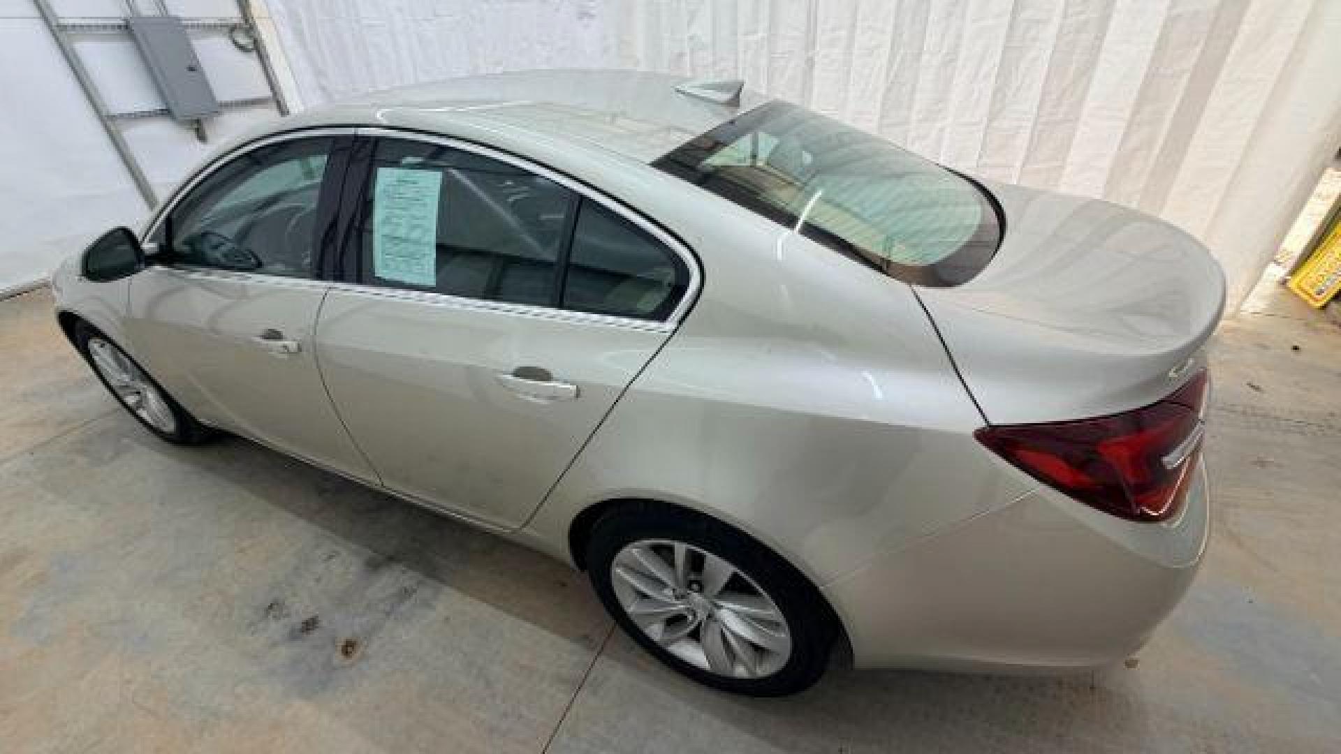 2016 White Buick Regal Turbo (2G4GK5EX3G9) with an 2L I-4 gasoline direct injection engine, located at 1806 Veterans Memorial Hwy SW, Austell, GA, 30168, (770) 944-9558, 33.817959, -84.606987 - Photo#2