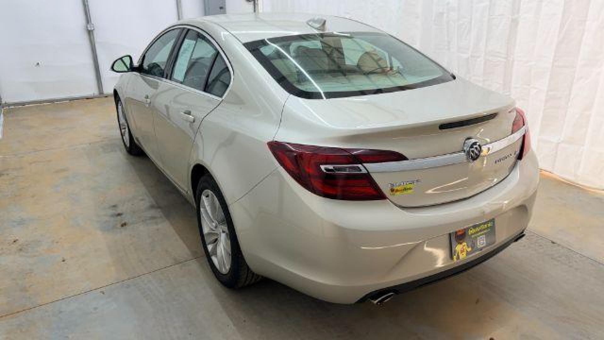2016 White Buick Regal Turbo (2G4GK5EX3G9) with an 2L I-4 gasoline direct injection engine, located at 1806 Veterans Memorial Hwy SW, Austell, GA, 30168, (770) 944-9558, 33.817959, -84.606987 - Photo#3