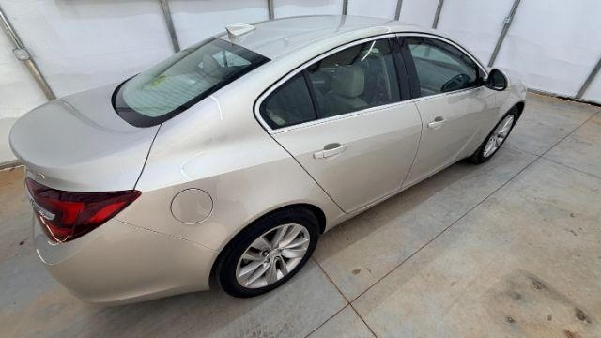2016 White Buick Regal Turbo (2G4GK5EX3G9) with an 2L I-4 gasoline direct injection engine, located at 1806 Veterans Memorial Hwy SW, Austell, GA, 30168, (770) 944-9558, 33.817959, -84.606987 - Photo#6