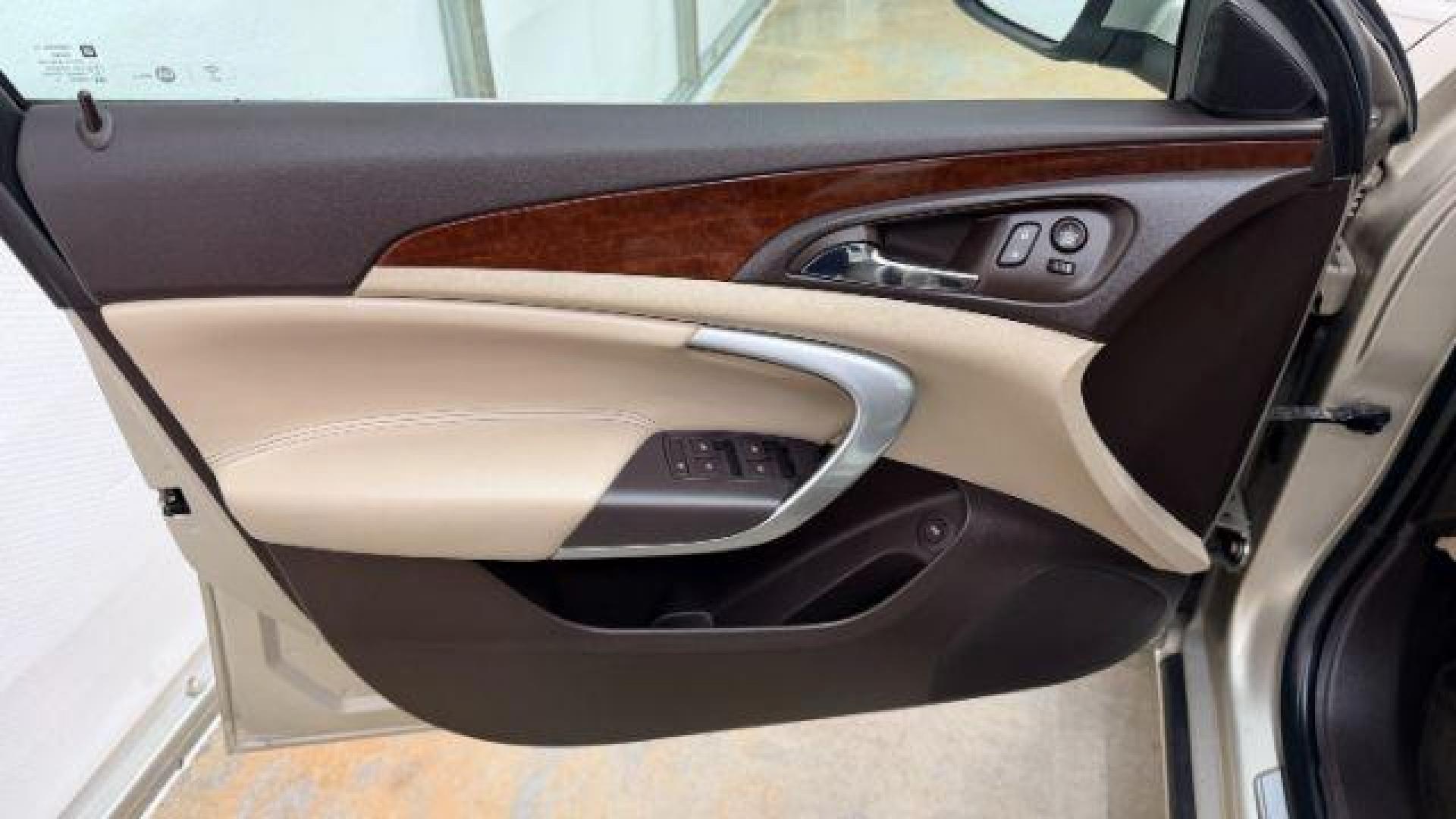 2016 White Buick Regal Turbo (2G4GK5EX3G9) with an 2L I-4 gasoline direct injection engine, located at 1806 Veterans Memorial Hwy SW, Austell, GA, 30168, (770) 944-9558, 33.817959, -84.606987 - Photo#10