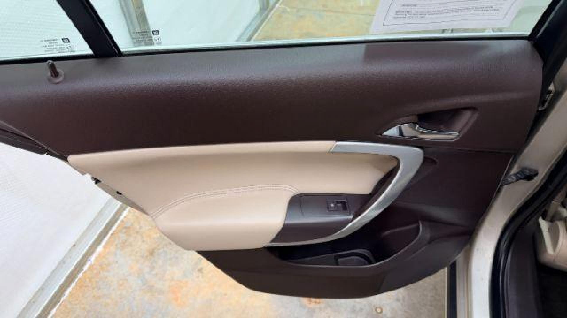 2016 White Buick Regal Turbo (2G4GK5EX3G9) with an 2L I-4 gasoline direct injection engine, located at 1806 Veterans Memorial Hwy SW, Austell, GA, 30168, (770) 944-9558, 33.817959, -84.606987 - Photo#13