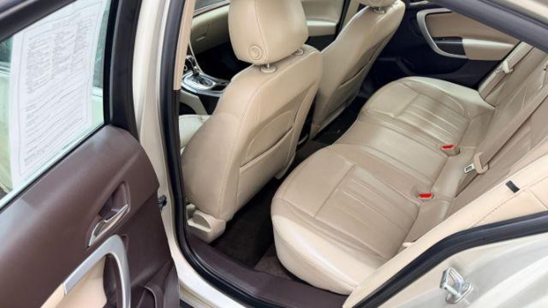 2016 White Buick Regal Turbo (2G4GK5EX3G9) with an 2L I-4 gasoline direct injection engine, located at 1806 Veterans Memorial Hwy SW, Austell, GA, 30168, (770) 944-9558, 33.817959, -84.606987 - Photo#14