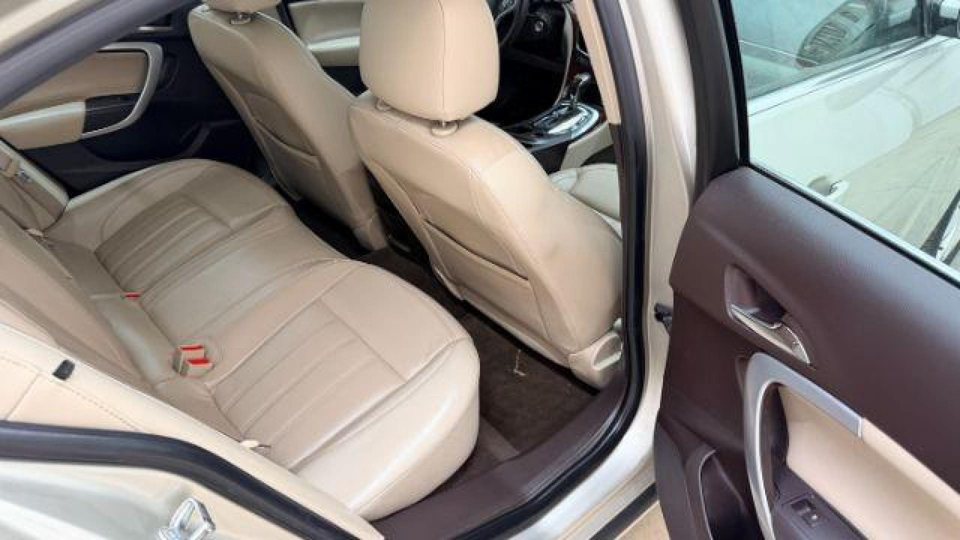 2016 White Buick Regal Turbo (2G4GK5EX3G9) with an 2L I-4 gasoline direct injection engine, located at 1806 Veterans Memorial Hwy SW, Austell, GA, 30168, (770) 944-9558, 33.817959, -84.606987 - Photo#18