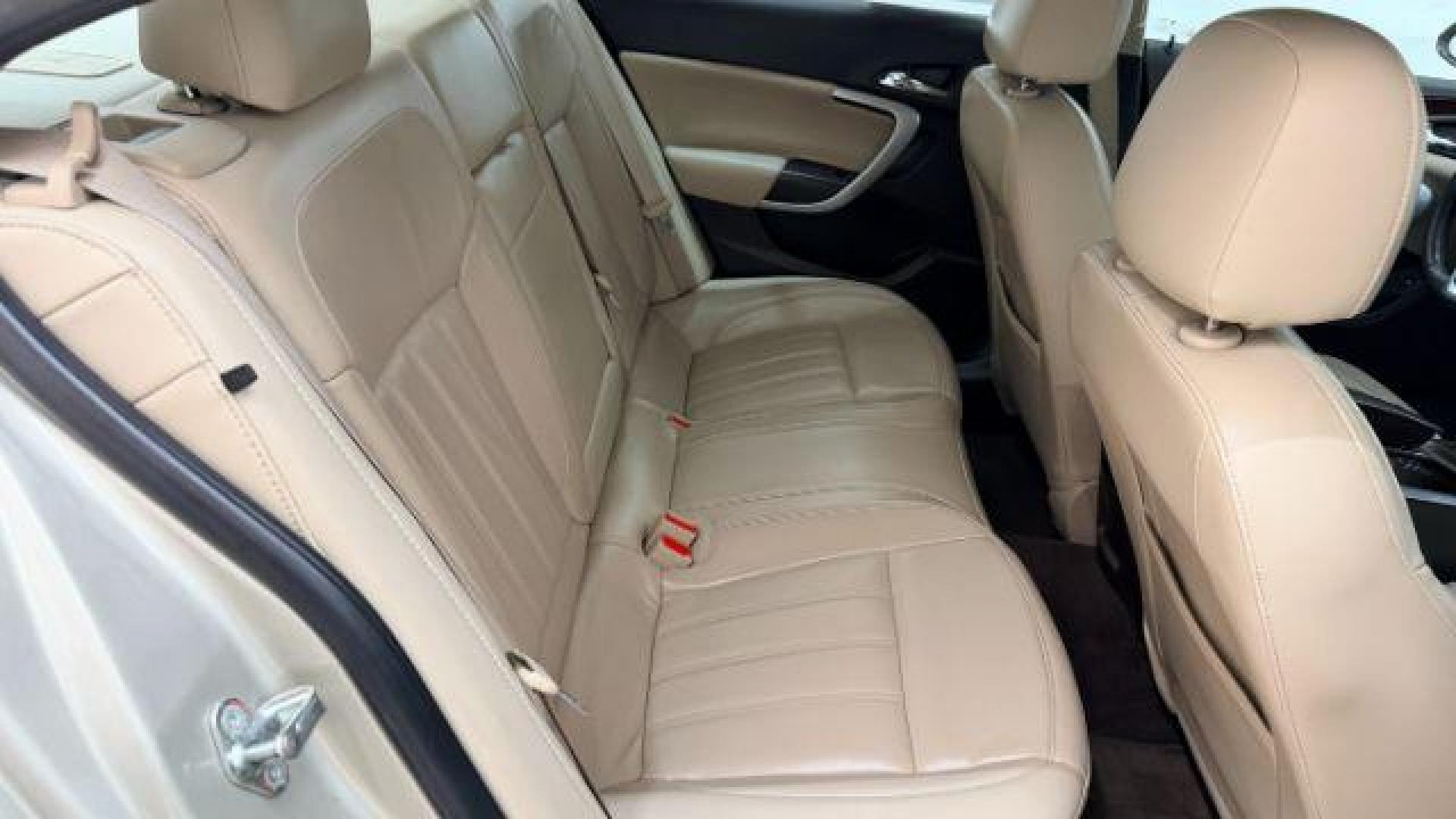 2016 White Buick Regal Turbo (2G4GK5EX3G9) with an 2L I-4 gasoline direct injection engine, located at 1806 Veterans Memorial Hwy SW, Austell, GA, 30168, (770) 944-9558, 33.817959, -84.606987 - Photo#19