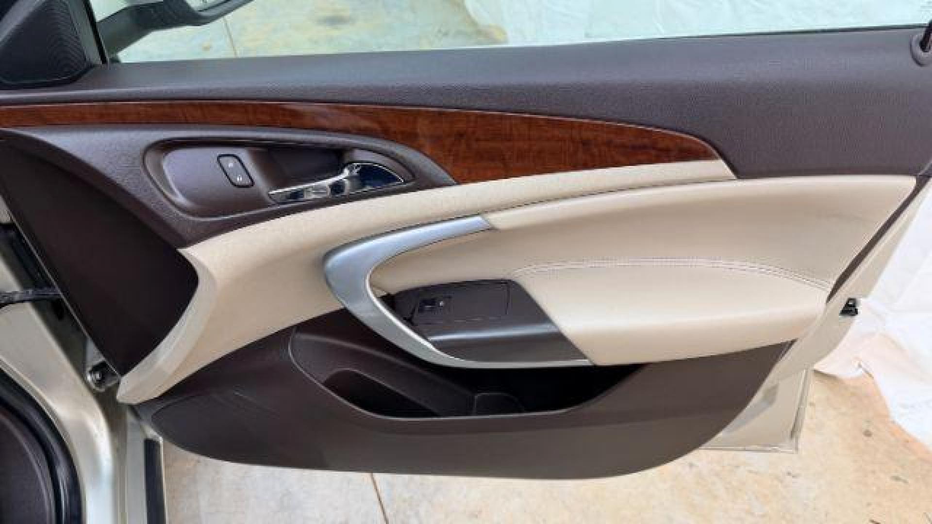 2016 White Buick Regal Turbo (2G4GK5EX3G9) with an 2L I-4 gasoline direct injection engine, located at 1806 Veterans Memorial Hwy SW, Austell, GA, 30168, (770) 944-9558, 33.817959, -84.606987 - Photo#20