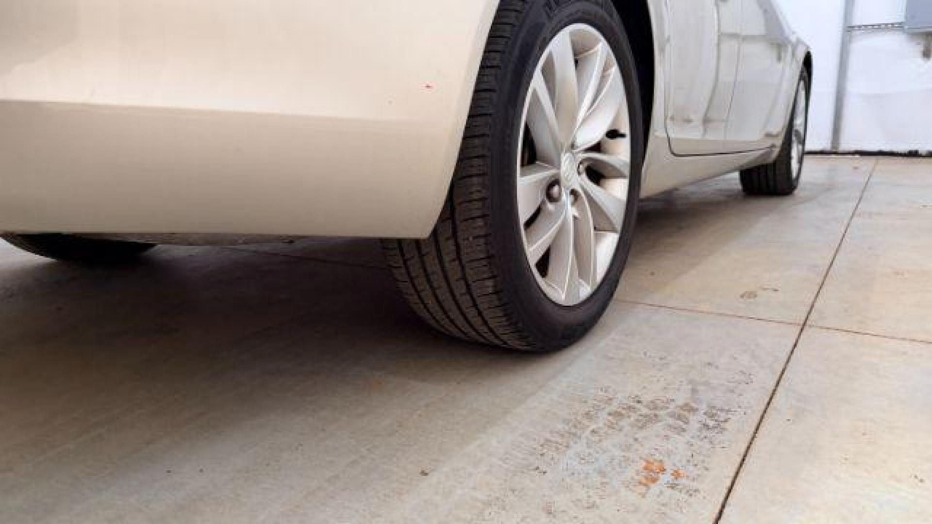 2016 White Buick Regal Turbo (2G4GK5EX3G9) with an 2L I-4 gasoline direct injection engine, located at 1806 Veterans Memorial Hwy SW, Austell, GA, 30168, (770) 944-9558, 33.817959, -84.606987 - Photo#25