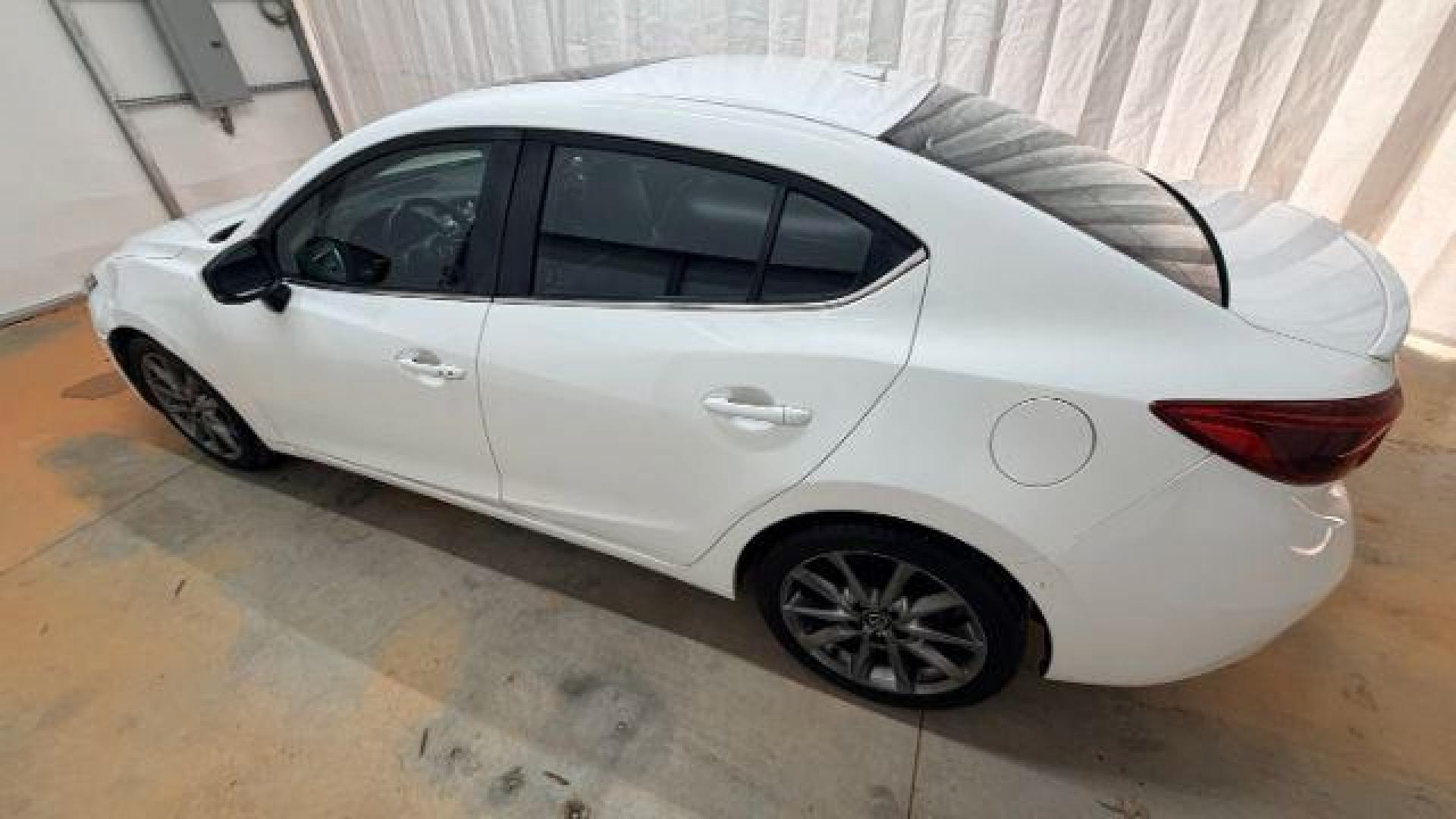 2018 White Mazda Mazda3 Grand Touring (3MZBN1W38JM) with an SKYACTIV-G 2.5L I-4 gasoline direct injection engine, located at 1806 Veterans Memorial Hwy SW, Austell, GA, 30168, (770) 944-9558, 33.817959, -84.606987 - Photo#2