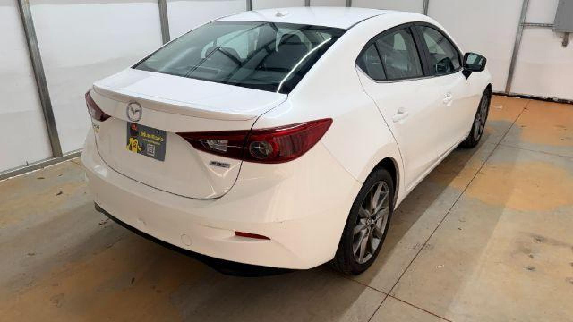 2018 White Mazda Mazda3 Grand Touring (3MZBN1W38JM) with an SKYACTIV-G 2.5L I-4 gasoline direct injection engine, located at 1806 Veterans Memorial Hwy SW, Austell, GA, 30168, (770) 944-9558, 33.817959, -84.606987 - Photo#5