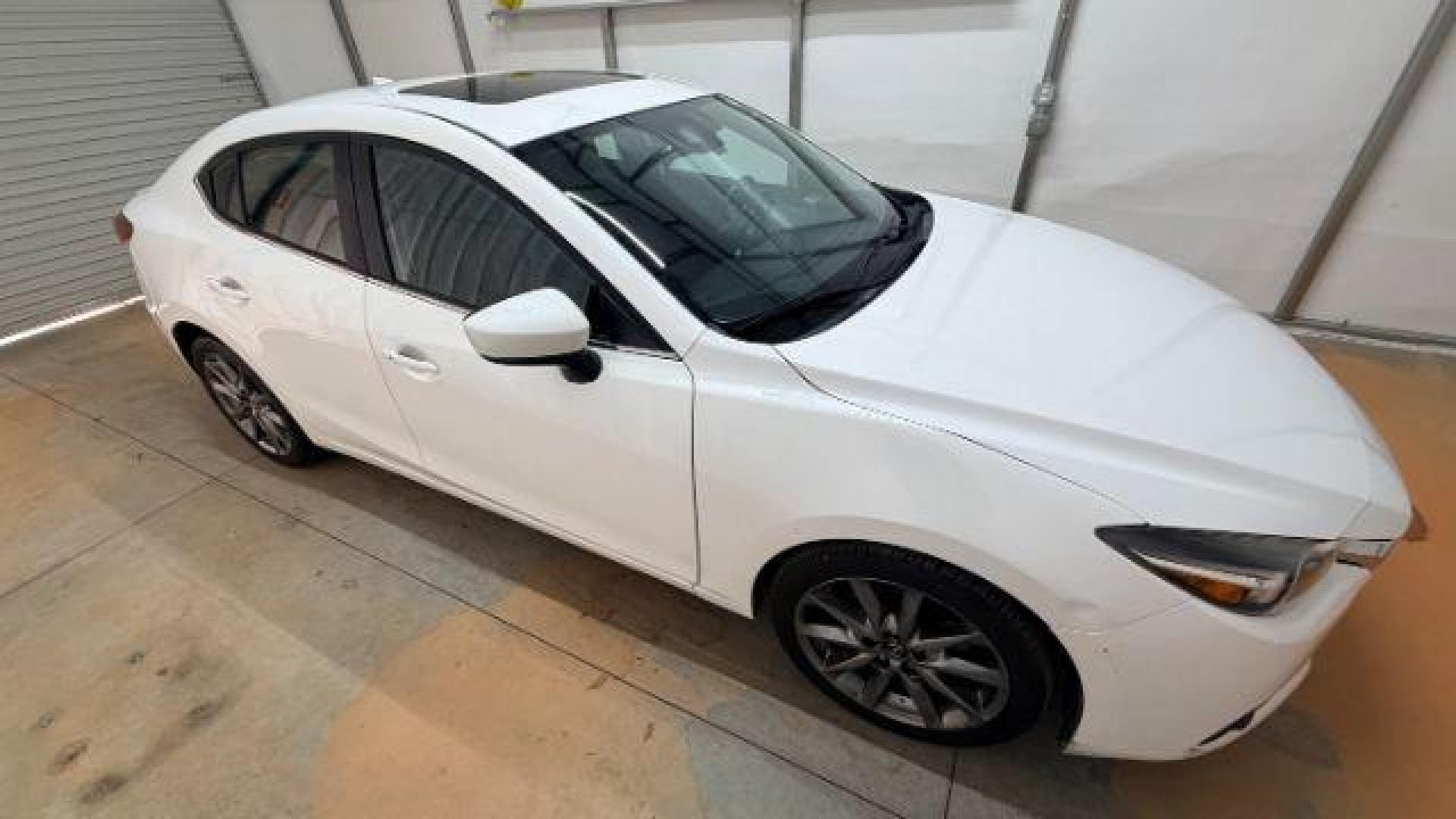 2018 White Mazda Mazda3 Grand Touring (3MZBN1W38JM) with an SKYACTIV-G 2.5L I-4 gasoline direct injection engine, located at 1806 Veterans Memorial Hwy SW, Austell, GA, 30168, (770) 944-9558, 33.817959, -84.606987 - Photo#7