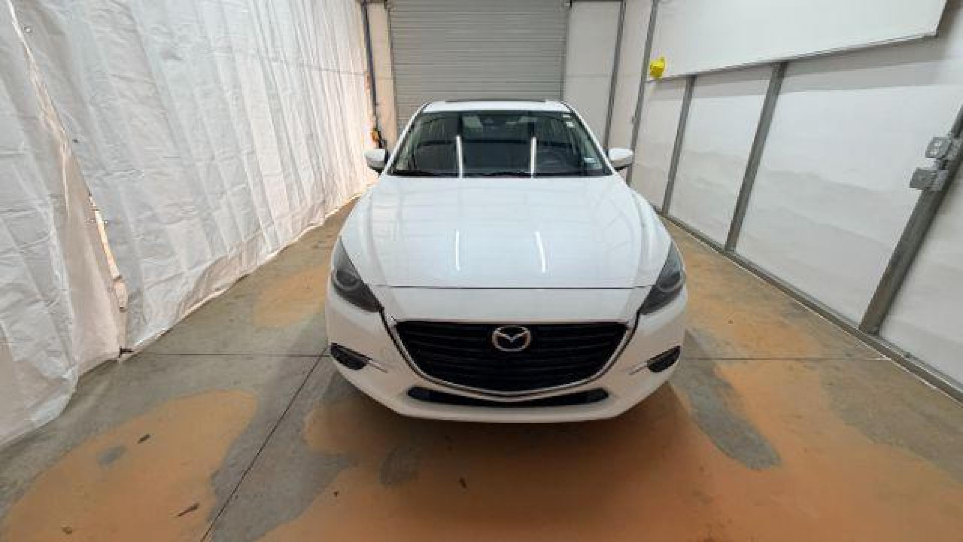 2018 White Mazda Mazda3 Grand Touring (3MZBN1W38JM) with an SKYACTIV-G 2.5L I-4 gasoline direct injection engine, located at 1806 Veterans Memorial Hwy SW, Austell, GA, 30168, (770) 944-9558, 33.817959, -84.606987 - Photo#9
