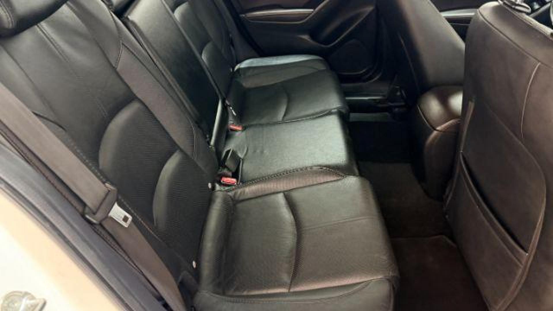 2018 White Mazda Mazda3 Grand Touring (3MZBN1W38JM) with an SKYACTIV-G 2.5L I-4 gasoline direct injection engine, located at 1806 Veterans Memorial Hwy SW, Austell, GA, 30168, (770) 944-9558, 33.817959, -84.606987 - Photo#15