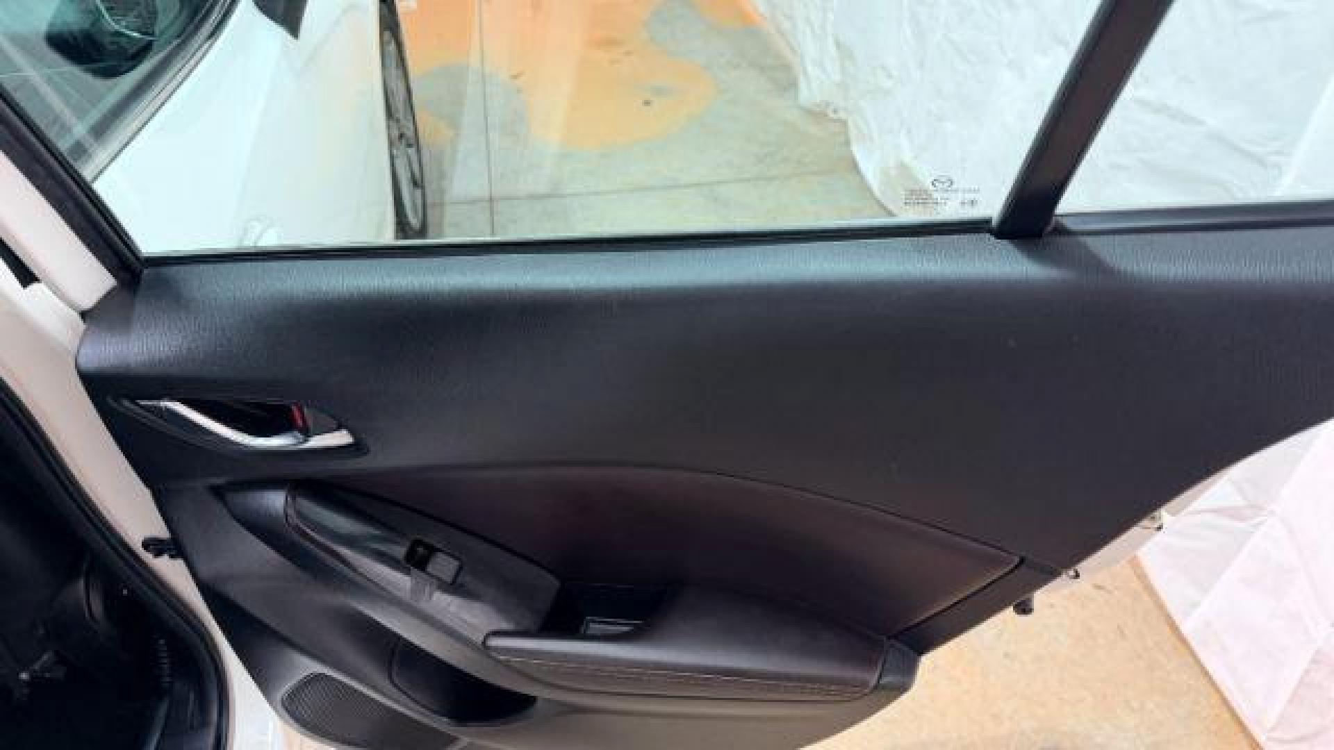 2018 White Mazda Mazda3 Grand Touring (3MZBN1W38JM) with an SKYACTIV-G 2.5L I-4 gasoline direct injection engine, located at 1806 Veterans Memorial Hwy SW, Austell, GA, 30168, (770) 944-9558, 33.817959, -84.606987 - Photo#28