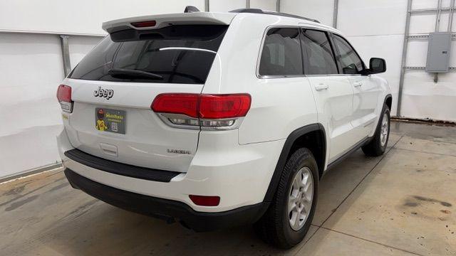 2016 White Jeep Grand Cherokee Laredo (1C4RJEAG6GC) with an Pentastar 3.6L V-6 DOHC engine, located at 1806 Veterans Memorial Hwy SW, Austell, GA, 30168, (770) 944-9558, 33.817959, -84.606987 - Photo#8