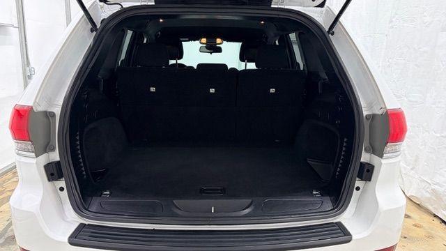 2016 White Jeep Grand Cherokee Laredo (1C4RJEAG6GC) with an Pentastar 3.6L V-6 DOHC engine, located at 1806 Veterans Memorial Hwy SW, Austell, GA, 30168, (770) 944-9558, 33.817959, -84.606987 - Photo#15