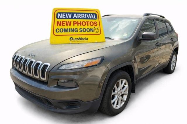 2015 Green Jeep Cherokee Sport (1C4PJLAB5FW) , located at 1806 Veterans Memorial Hwy SW, Austell, GA, 30168, (770) 944-9558, 33.817959, -84.606987 - Photo#0
