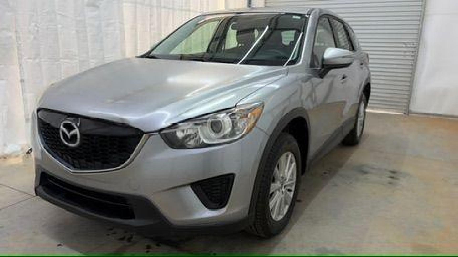 2015 Silver Mazda CX-5 Sport (JM3KE2BE8F0) with an SKYACTIV-G 2L I-4 gasoline direct injection engine, located at 1806 Veterans Memorial Hwy SW, Austell, GA, 30168, (770) 944-9558, 33.817959, -84.606987 - Photo#0