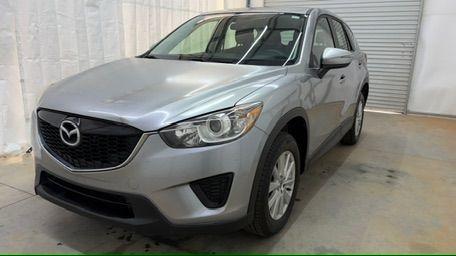 2015 Silver Mazda CX-5 Sport (JM3KE2BE8F0) with an SKYACTIV-G 2L I-4 gasoline direct injection engine, located at 1806 Veterans Memorial Hwy SW, Austell, GA, 30168, (770) 944-9558, 33.817959, -84.606987 - Photo#0