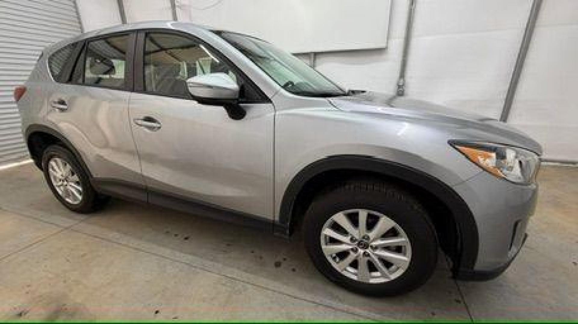 2015 Silver Mazda CX-5 Sport (JM3KE2BE8F0) with an SKYACTIV-G 2L I-4 gasoline direct injection engine, located at 1806 Veterans Memorial Hwy SW, Austell, GA, 30168, (770) 944-9558, 33.817959, -84.606987 - Photo#7