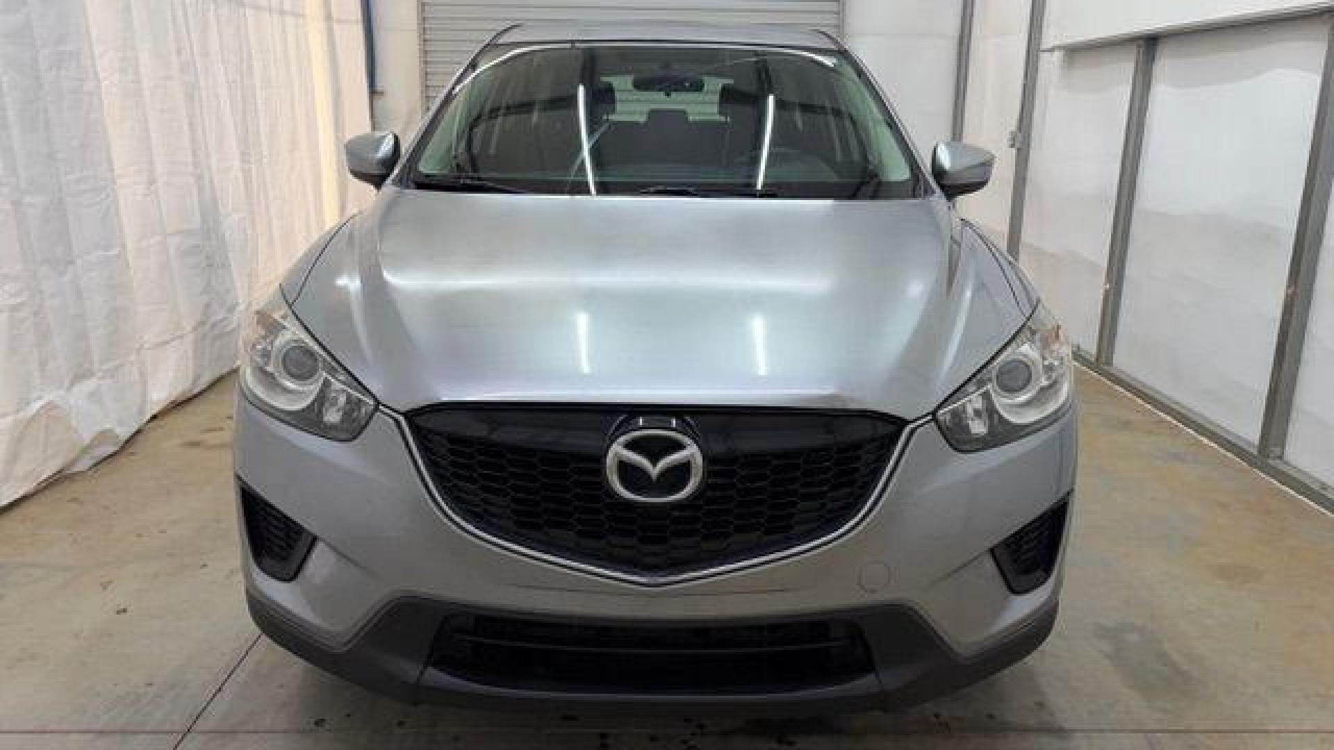 2015 Silver Mazda CX-5 Sport (JM3KE2BE8F0) with an SKYACTIV-G 2L I-4 gasoline direct injection engine, located at 1806 Veterans Memorial Hwy SW, Austell, GA, 30168, (770) 944-9558, 33.817959, -84.606987 - Photo#9