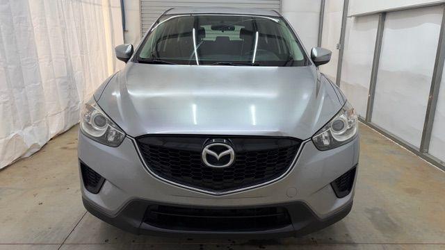 2015 Silver Mazda CX-5 Sport (JM3KE2BE8F0) with an SKYACTIV-G 2L I-4 gasoline direct injection engine, located at 1806 Veterans Memorial Hwy SW, Austell, GA, 30168, (770) 944-9558, 33.817959, -84.606987 - Photo#9