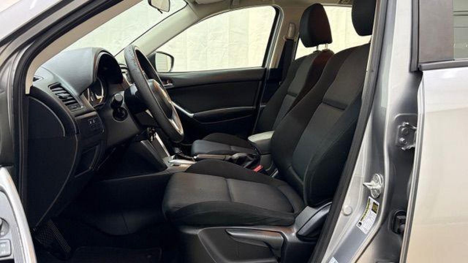 2015 Silver Mazda CX-5 Sport (JM3KE2BE8F0) with an SKYACTIV-G 2L I-4 gasoline direct injection engine, located at 1806 Veterans Memorial Hwy SW, Austell, GA, 30168, (770) 944-9558, 33.817959, -84.606987 - Photo#11