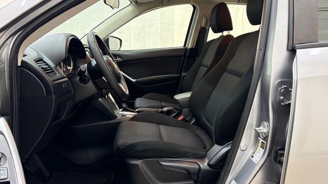 2015 Silver Mazda CX-5 Sport (JM3KE2BE8F0) with an SKYACTIV-G 2L I-4 gasoline direct injection engine, located at 1806 Veterans Memorial Hwy SW, Austell, GA, 30168, (770) 944-9558, 33.817959, -84.606987 - Photo#11