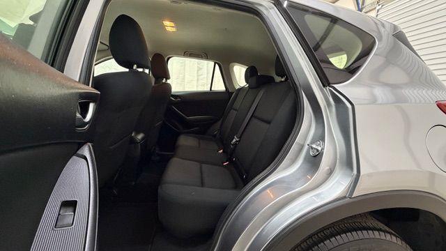 2015 Silver Mazda CX-5 Sport (JM3KE2BE8F0) with an SKYACTIV-G 2L I-4 gasoline direct injection engine, located at 1806 Veterans Memorial Hwy SW, Austell, GA, 30168, (770) 944-9558, 33.817959, -84.606987 - Photo#14