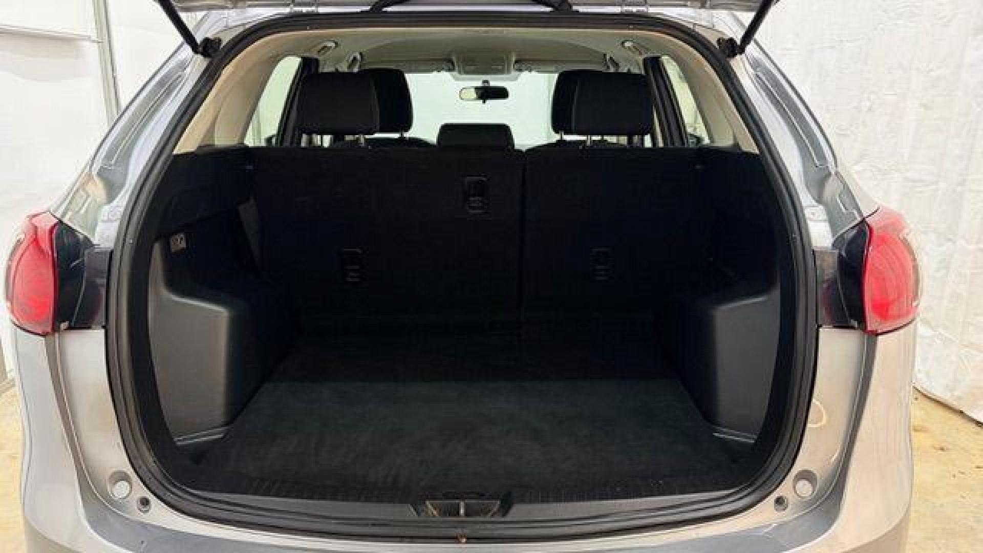 2015 Silver Mazda CX-5 Sport (JM3KE2BE8F0) with an SKYACTIV-G 2L I-4 gasoline direct injection engine, located at 1806 Veterans Memorial Hwy SW, Austell, GA, 30168, (770) 944-9558, 33.817959, -84.606987 - Photo#16